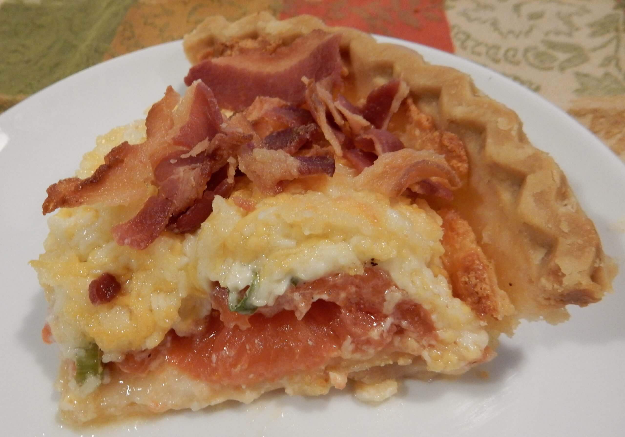 Savory tomato pie is a perfect side for dinner or addition to breakfast.