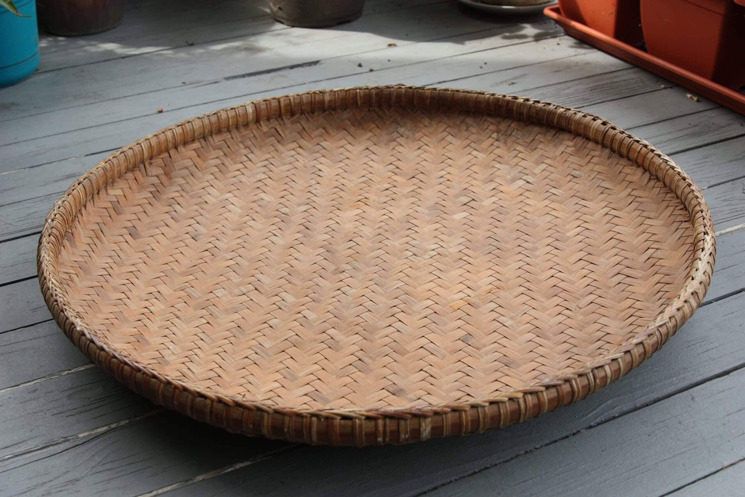 This Indonesian winnowing basket, called a Nyiru, was created for rice.